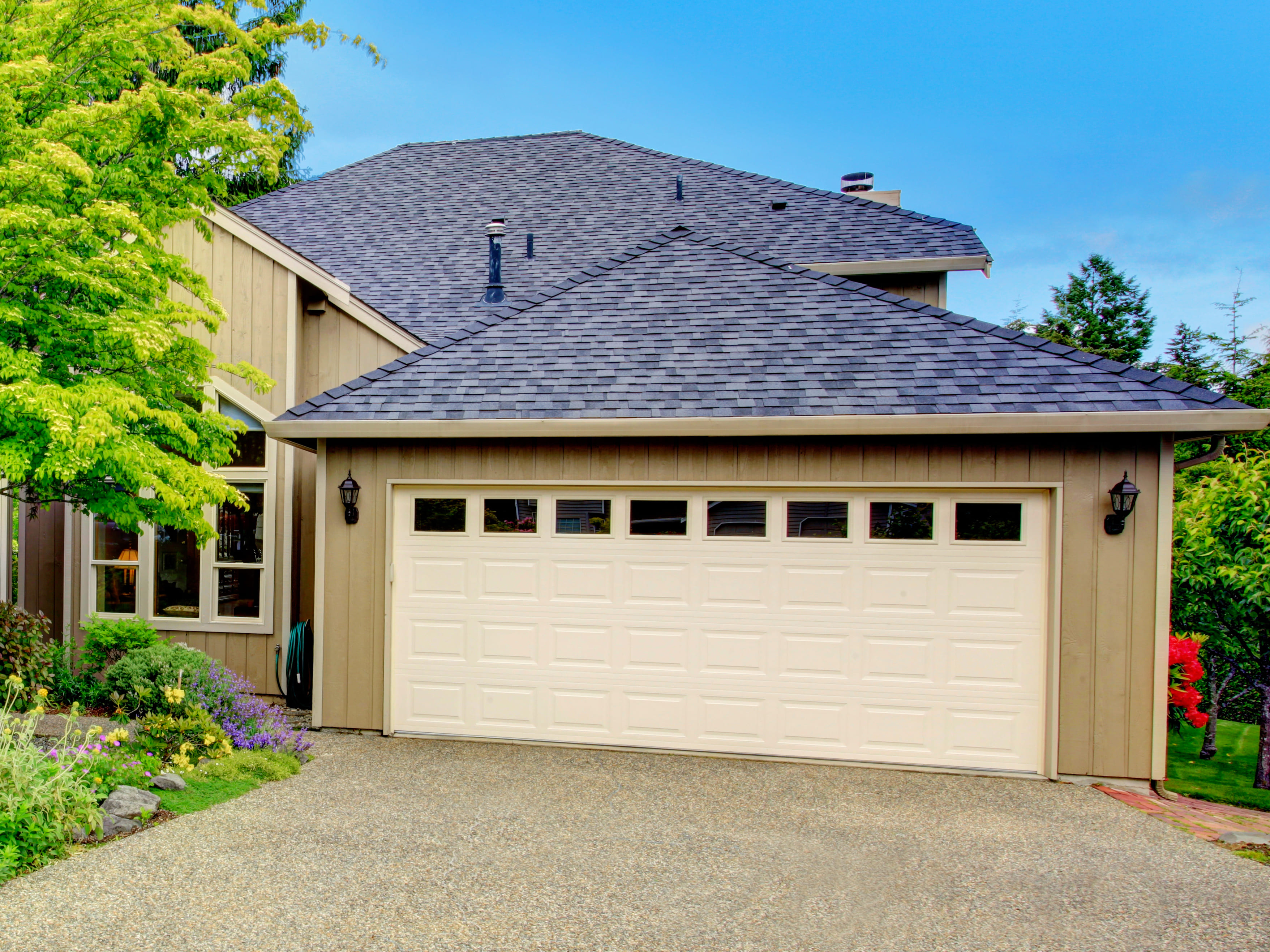 Exterior photo of single story home with a new roof